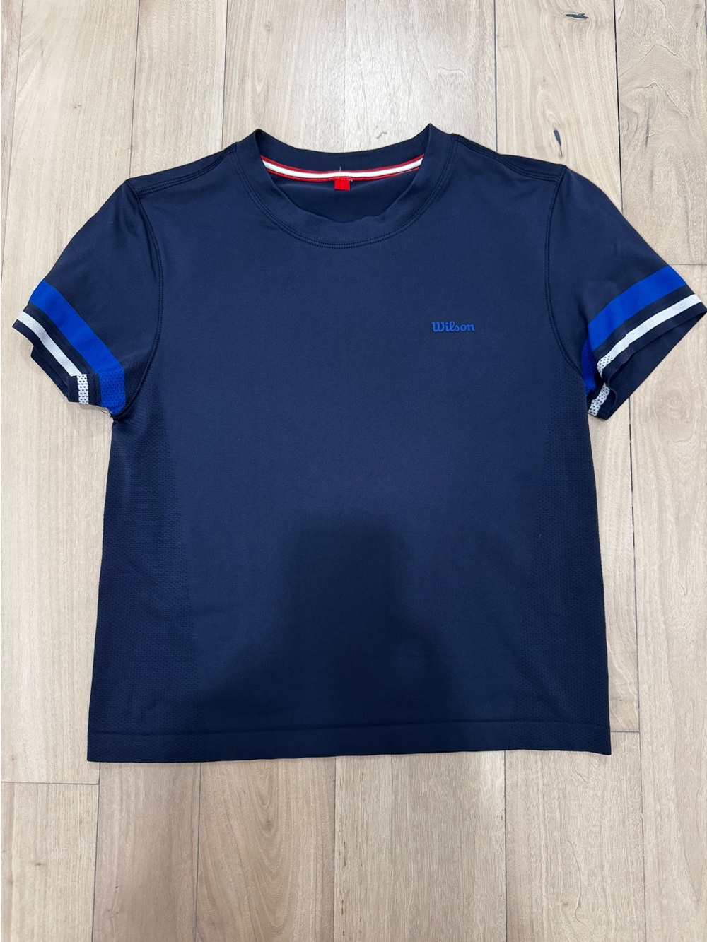 Wilson Navy Tee with Royal and White Sleeve Stripes